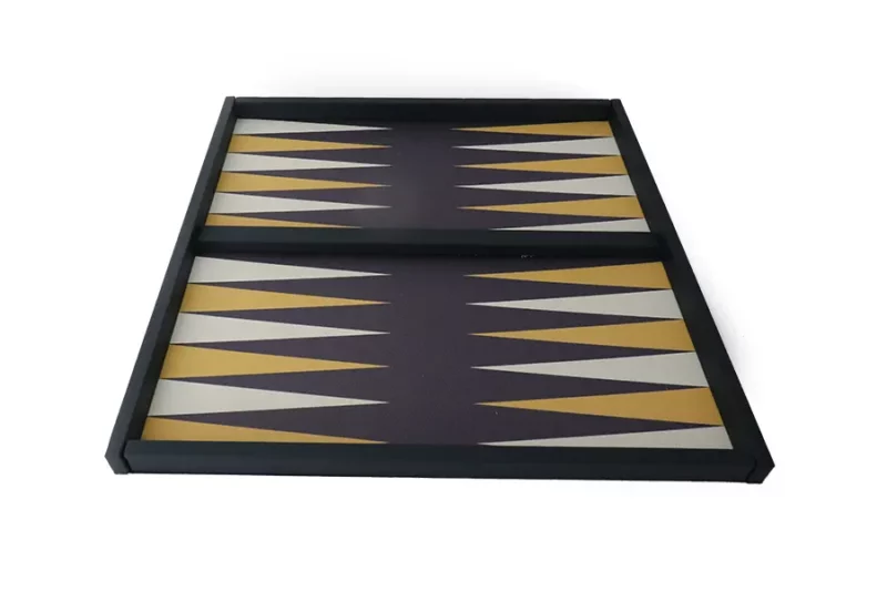 Luxury backgammon board with black and gold design, perfect for elegant gaming sessions.