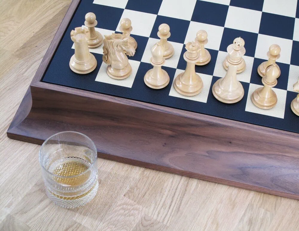 Luxury Wooden Chess Set | Geoffrey Parker | Backgammon Sets Luxurious Wooden Chess Set With A Glass Of Whisky, Showcasing Craftsmanship By Geoffrey Parker.